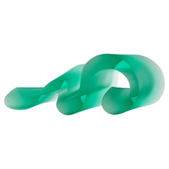 Line Aquamarine, a soft jade green fluid cast glass sculpture by Karin Mørch