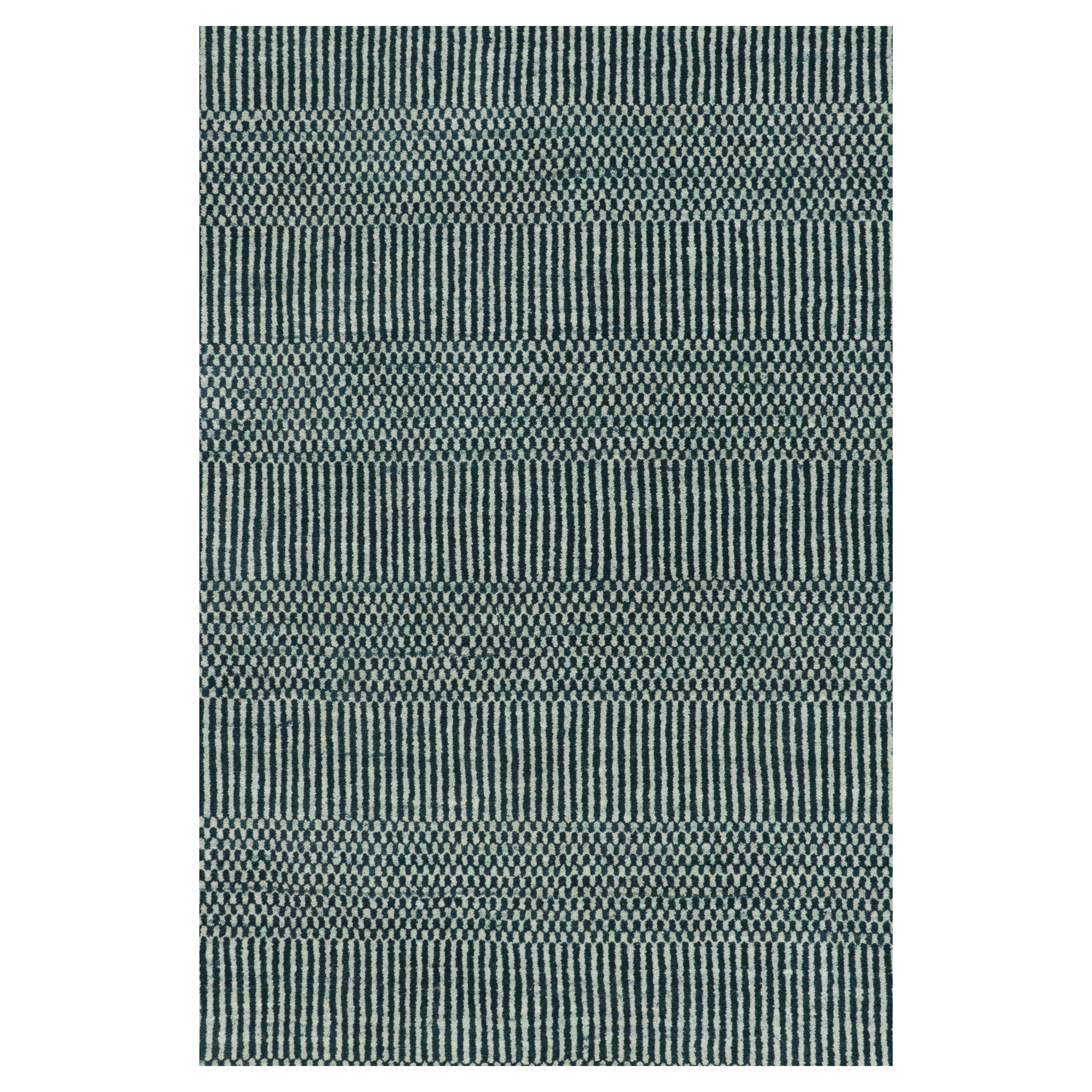 Rug & Kilim’s Modern Rug in Blue and Cream, with Stripes and Geometric Patterns
