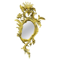 Brass Rococo Wall Mirror with Putti With Wings and Ornate Details