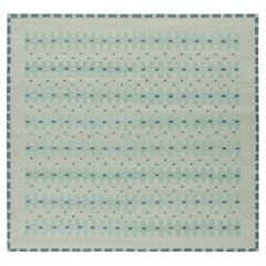 Rug & Kilim: design personalizzato per tappeti in stile scandinavo con motivi geometrici verde acqua
