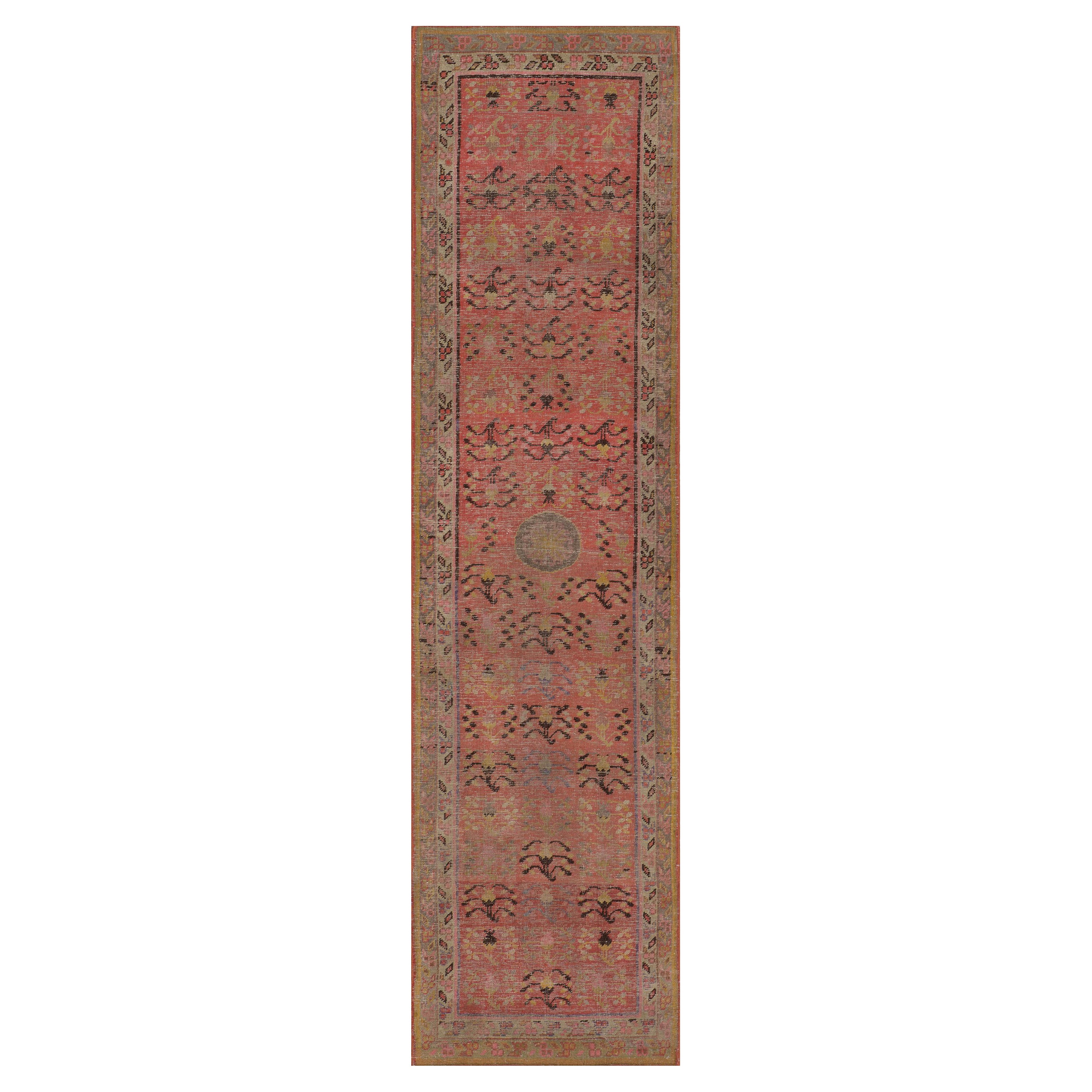 Wool Hand-Woven Antique Red Khotan Runner with Delicate Floral Design