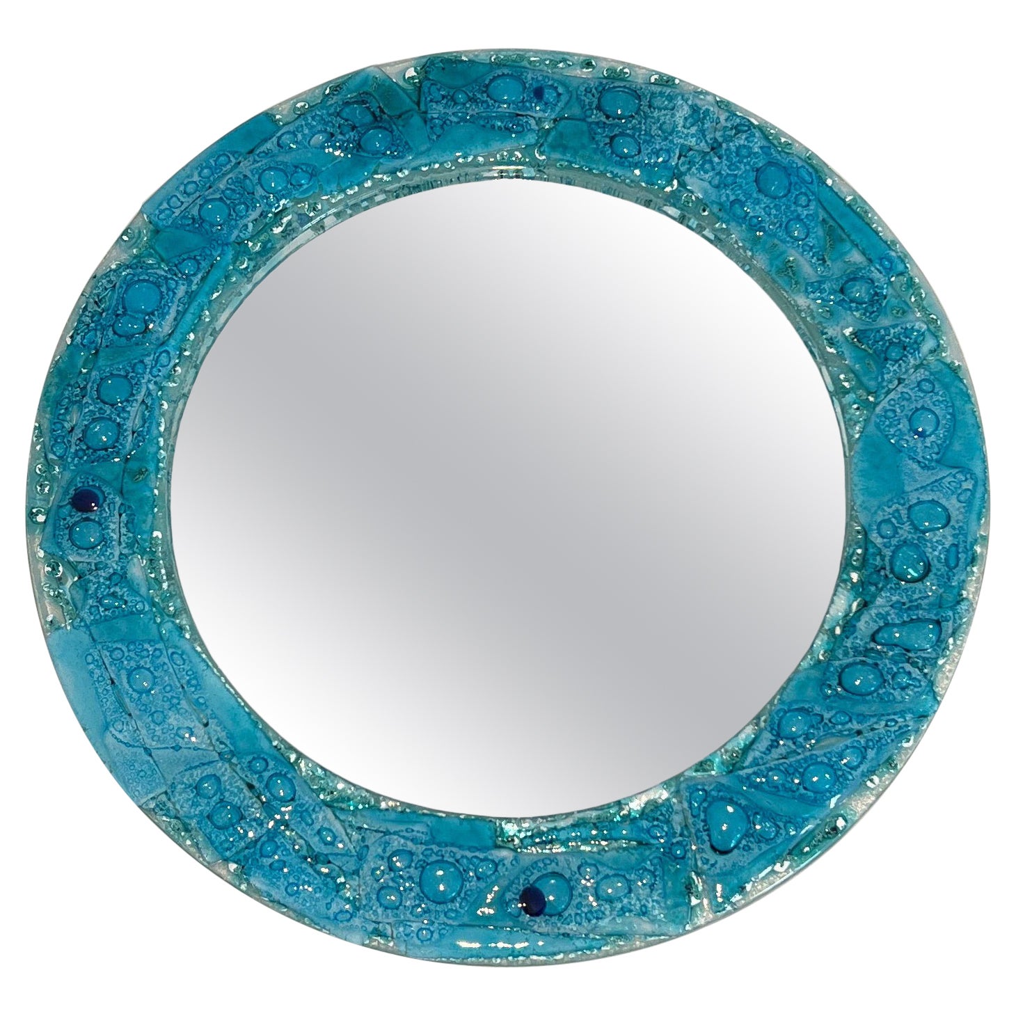 Miroir rond en verre bleuté. Travail français. Circa 1970