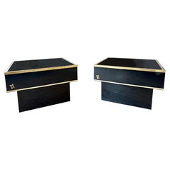 A Pair Of Black Lacquered And Brass Trimmed Tables