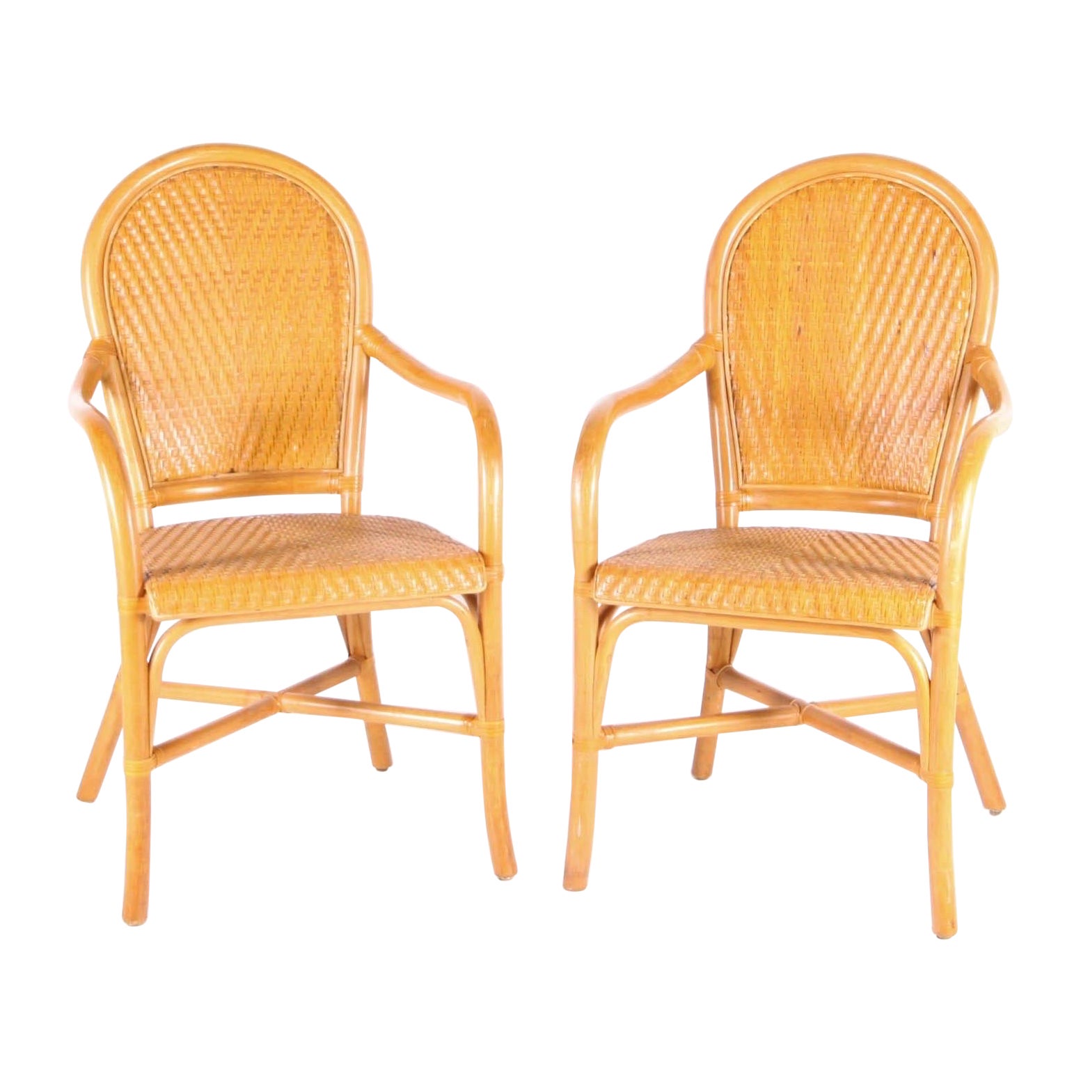 Coppia di poltrone in rattan e pelle intrecciata a mano in vendita