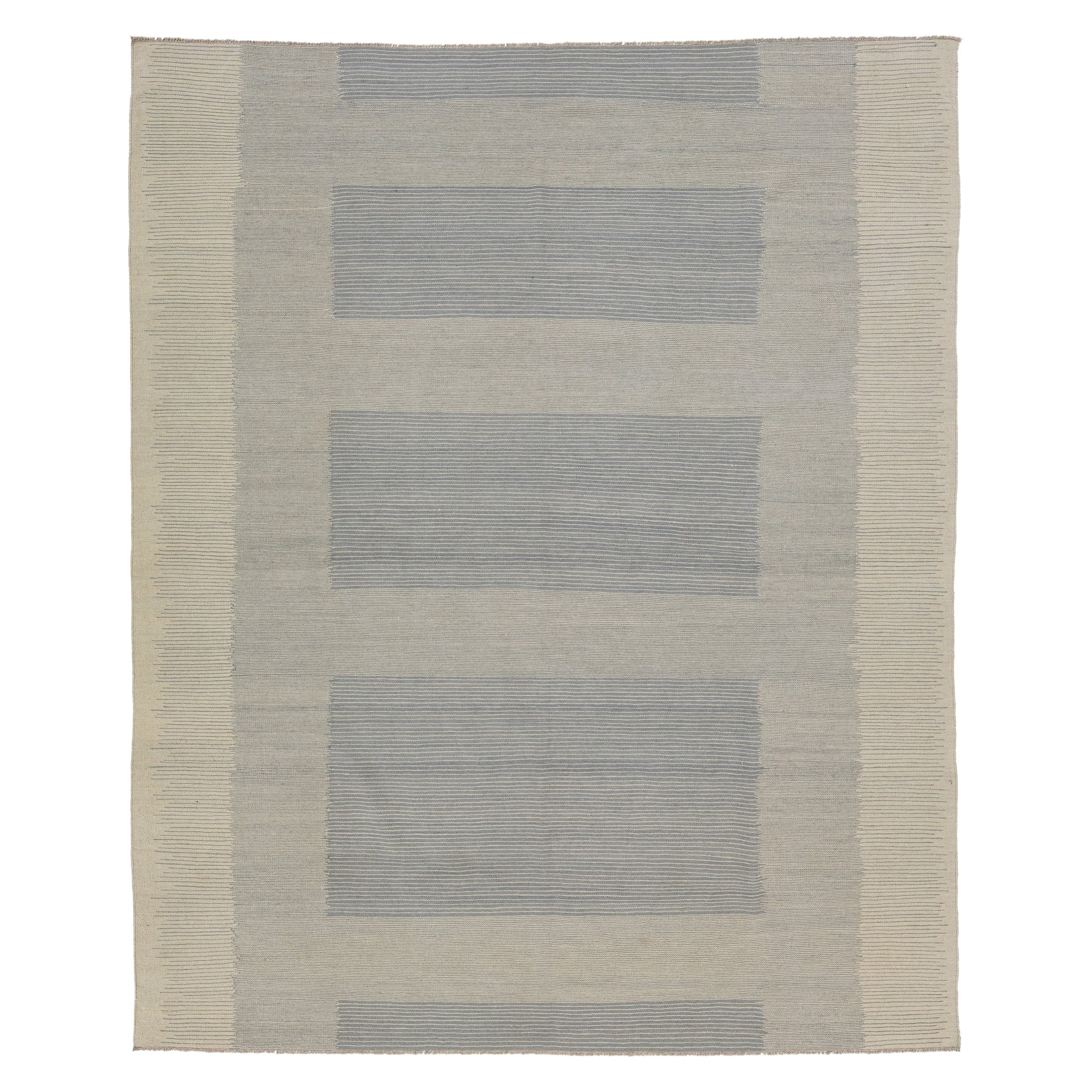 Alfombra moderna de lana Kilim Flaweave con motivos geométricos en beige y gris