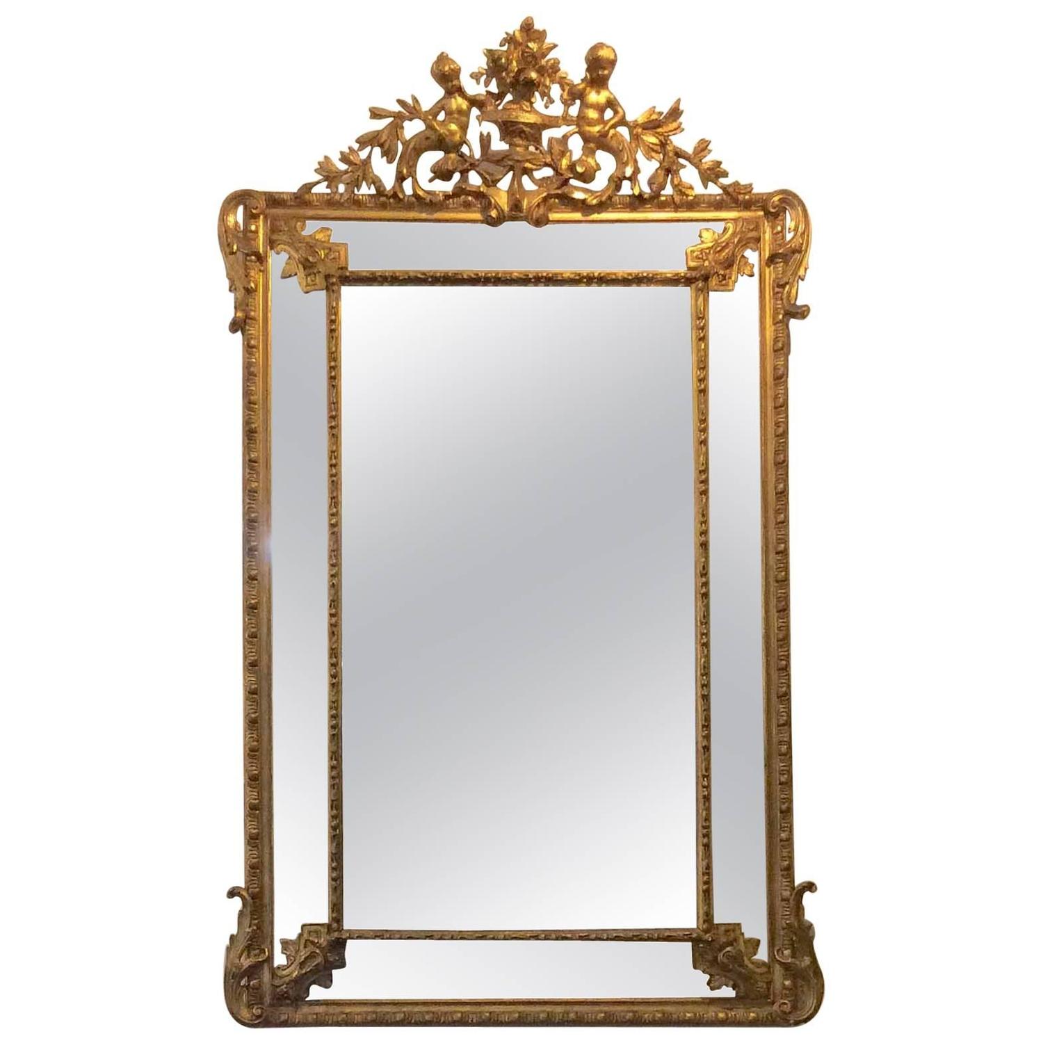 French Gold Gilt Mirror with Cherubs and Beveled Glass For Sale at 1stdibs