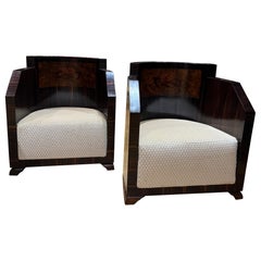A rare pair of Italian Macassar Ebony armchairs