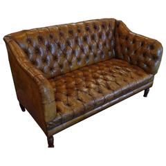 Tufted Two-Seater Chesterfield Sofa Antique Tufted Two-Seater Chesterfield Sofa