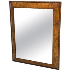 Early 18th Century Walnut Cushion Framed Mirror