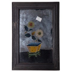 Peinture sur verre inversé avec chrysanthèmes jaunes