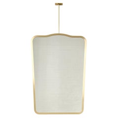 Miroir suspendu d'inspiration Gio Ponti, cadre en laiton, quatre vintage