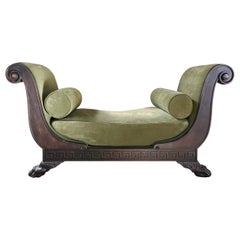 A gothic claw-footed daybed with olive green suede, 20th century