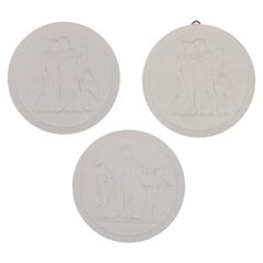 Royal Copenhagen. Three biscuit plates with motifs by Bertil Thorvaldesen.