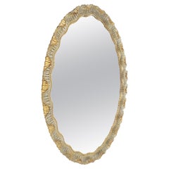 ¡Espejo de pared ovalado con borde de vieira de madera tallada, plateado y dorado, de la década de 1970 MINT!