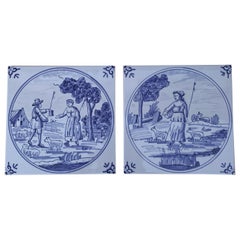 Antique Dutch Delft Style Craftsmen Blue and White Tiles, Pair