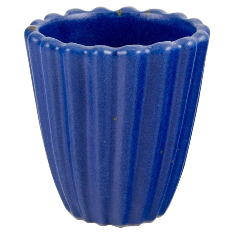 Christian Poulsen, own workshop, Denmark.  Unique ceramic vase in grooved design