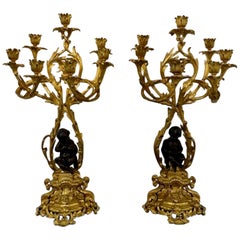 Pair of 19th Century French Gilt Bronze Candelabra with Putti