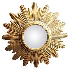 Espejo dorado sunburst vintage, años 60