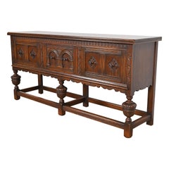 Baker Furniture English Jacobean Ornate Carved Oak Sideboard or Credenza