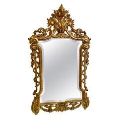 Antique European Carved Wood with Gold Leaf Beveled Mirror, Circa 1880.