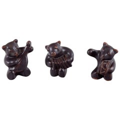 Hjorth, Bornholm. Three bear musicians in stoneware. Brown glaze.