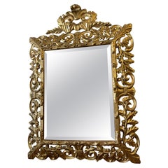 19th century Italian mirror in gilded carved wood, with Oak Leaf decoration