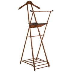 Valet in the style of Jacques Adnet. Bambú and brown leather. Spain 1960's.