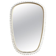 Miroir ovoïde de Josef Frank pour Svenskt Tenn, Suède, 1950.