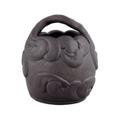 Hjorth, Bornholm. Beautiful vase with handle in black terracotta. Early 1900s.