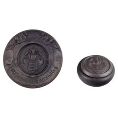 Hjorth, Bornholm. Wall relief and lidded jar in black terracotta.