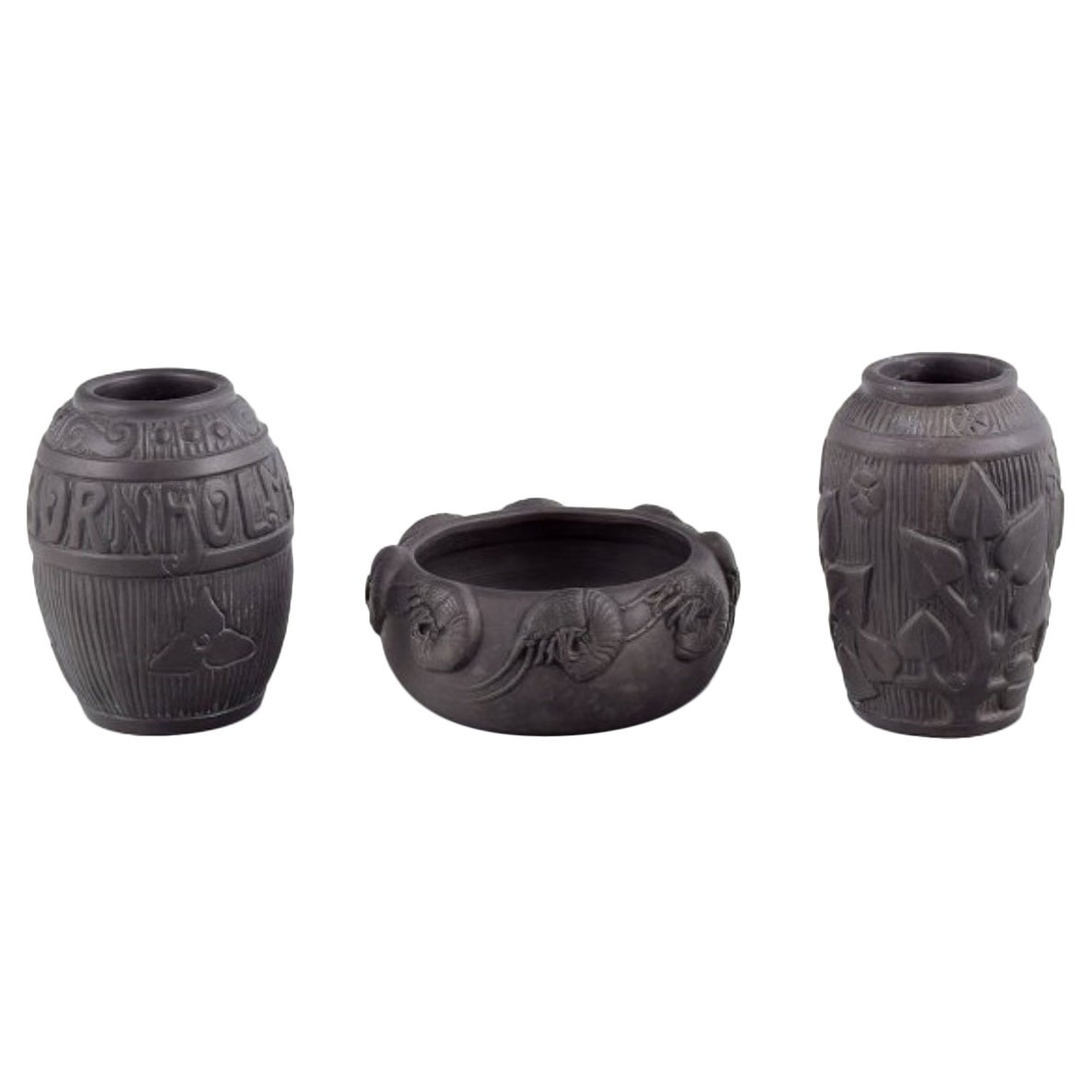 Hjorth, Bornholm. Two beautiful vases and a bowl in black terracotta.