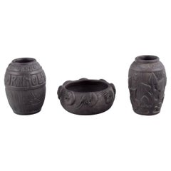 Hjorth, Bornholm. Two beautiful vases and a bowl in black terracotta.