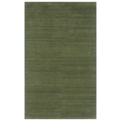Alfombras de lana tejidas a mano en tonos verdes intensos, diseño de textura orgánica