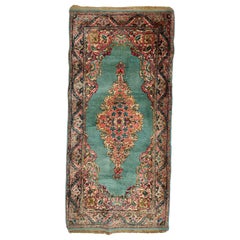 Antico tappeto mini persiano Kirman blu chiaro e turchese, 1950 ca.