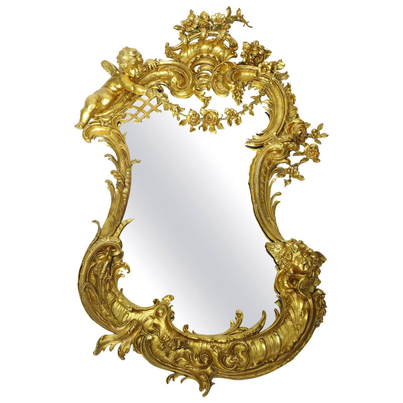 Belle Epoque 19th-20th Century Louis XV Style Giltwood Carved Cherub Mirror