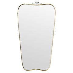 A large original 1950s shaped brass framed mirror attributed to Gio Ponti