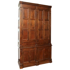 Central Italian Solid Walnut 8-Door, 4-Drawer 2-Piece Cabinet, mid 19th century