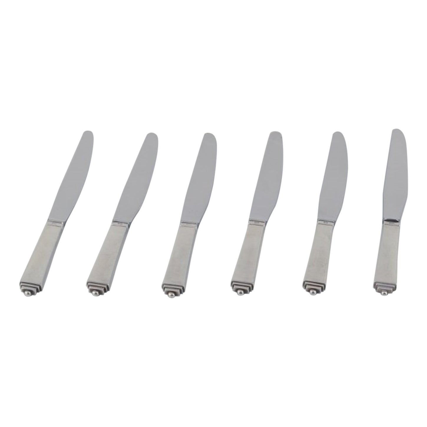 Pirámide Georg Jensen. Juego de seis cuchillos de mesa de mango corto en plata de ley