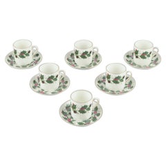 Royal Tuscan, England. Set of six cups and saucers. The “Noel” series.