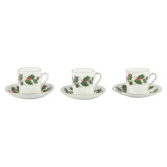 Royal Tuscan, England. Three pairs of cups and saucers. The “Noel” series.