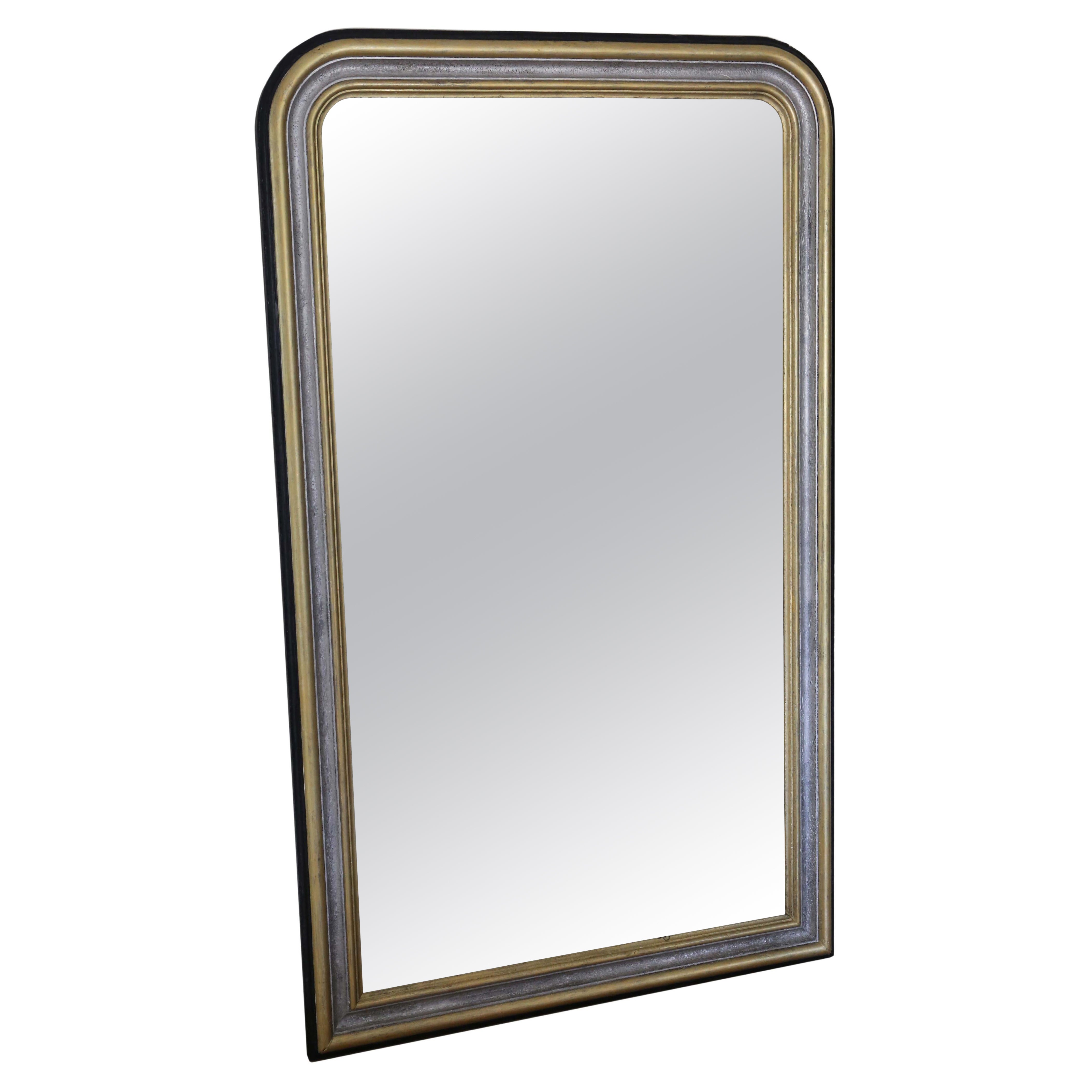 Miroir mural ancien du 19ème siècle de très grande qualité, en argent ébénisé et doré