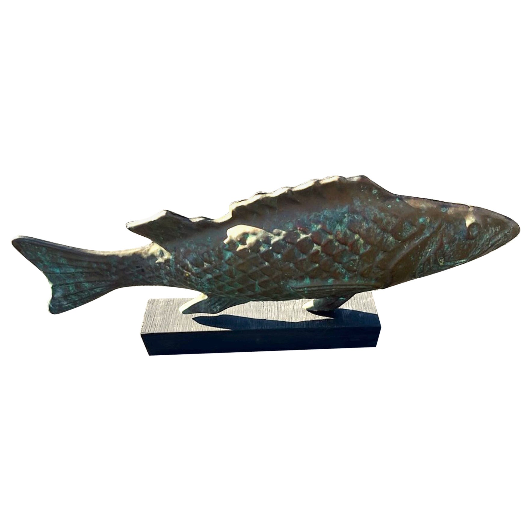 Early 20thc Hollow Body  fish weather vane made from copper with a nice aged patina custom base/stand made for the fish. This weather vane was found in Cape Cod. 
Measurements of copper fish are 26w x 12h x 5d.