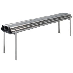 Extruded and polished aluminium bench "Love seat" by Deon Rubi. Argentina, 2024.