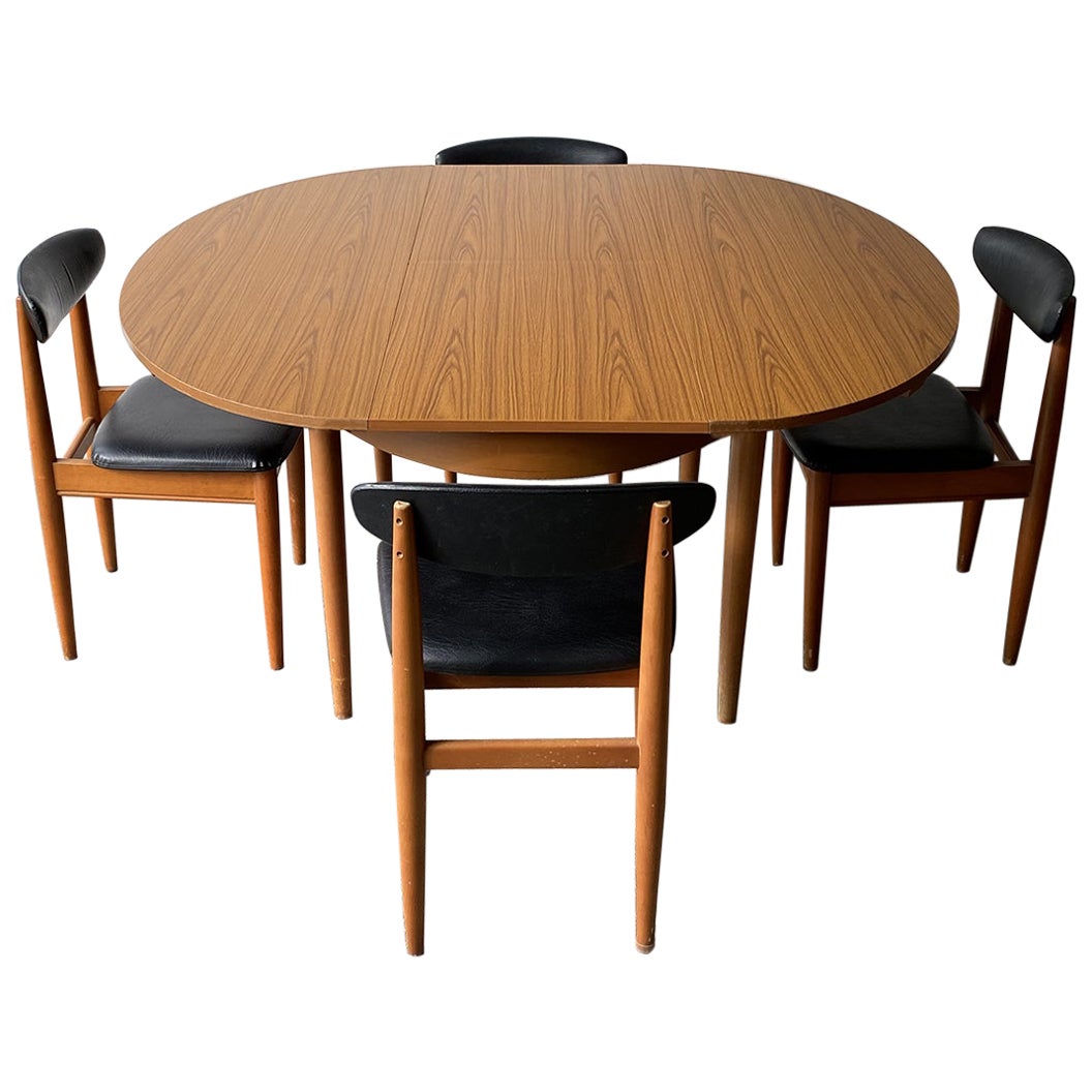 1960s Mid-Century dining table and dining chairs by Schreiber Furniture For Sale