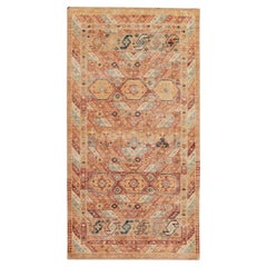 Rug & Kilim è un runner in stile distrutto con motivo tribale arancione, oro e rosso
