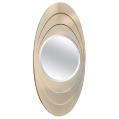 Vintage Space Age oval mirror with lacquered wood frame 1970s