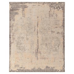Rug & Kilim è un tappeto moderno in stile degradato con motivi astratti grigi e beige.