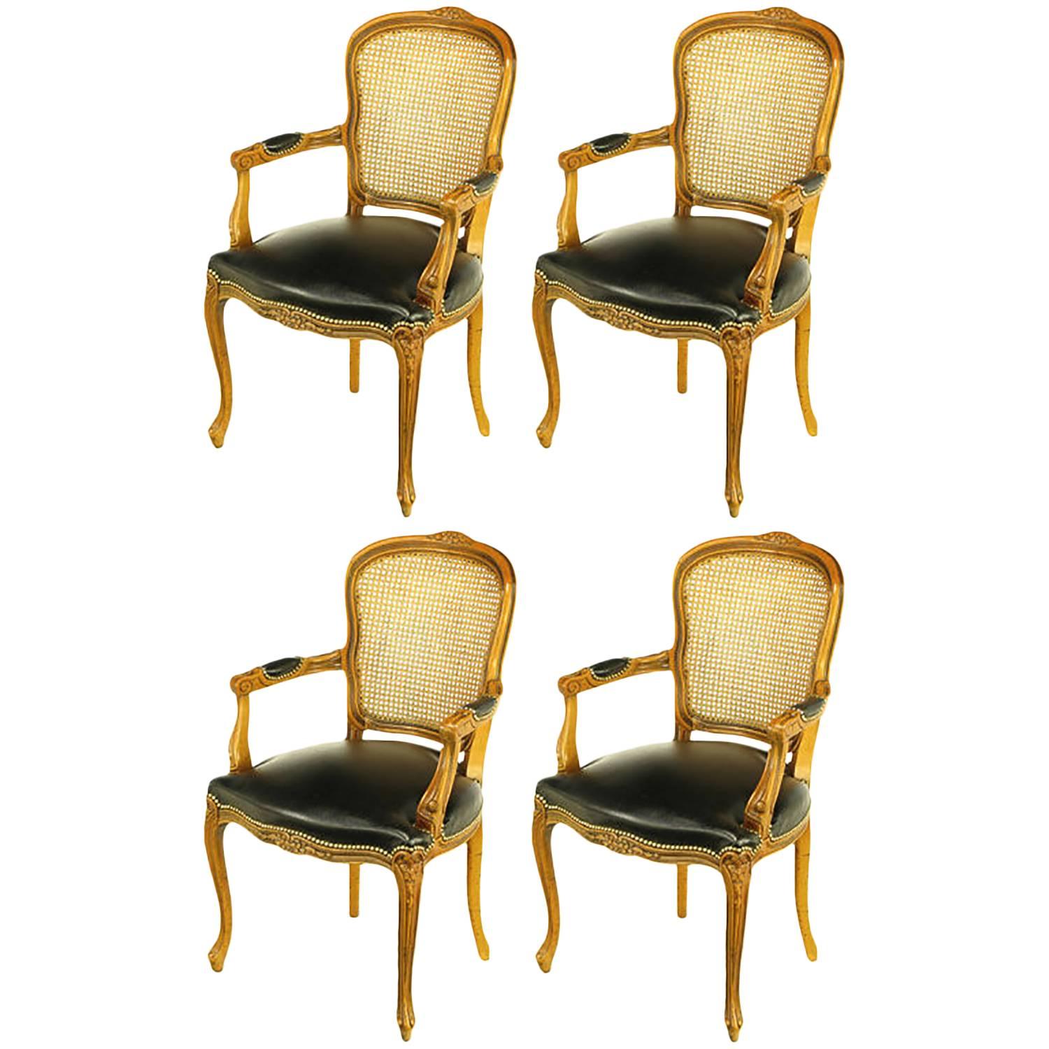 Four Italian Carved Wood and Black Leather Armchairs