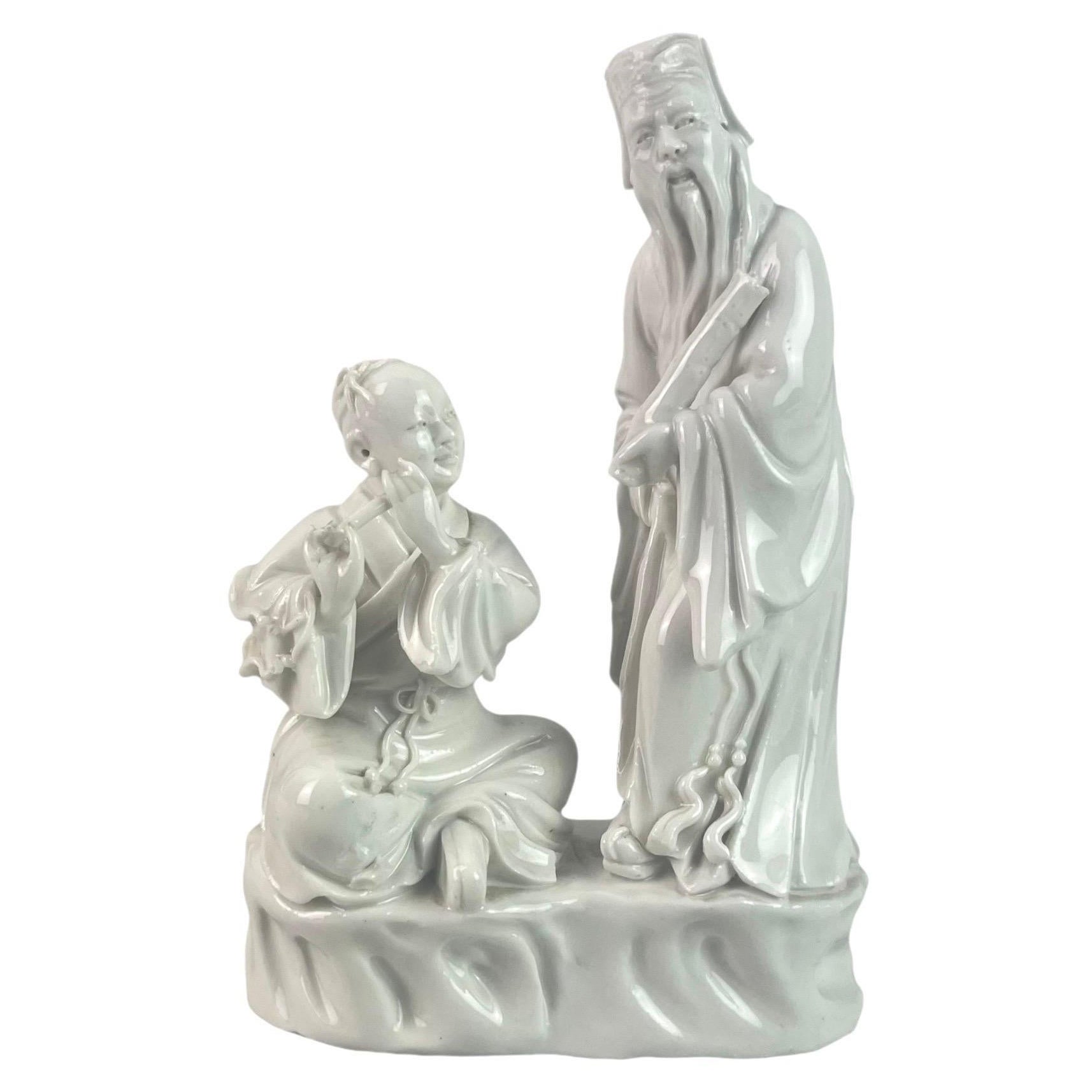 "Blanc de Chine" Statuetta in porcellana di musicisti flautisti - Cina - 19° Qing