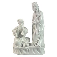 "Blanc de Chine" Porcelain figurine of flutist musicians - China - Qing 19th